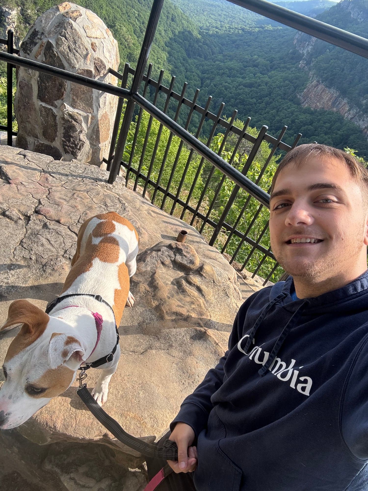 Lylah standing at a mountain overlook